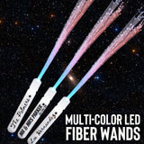 three multi - color led fiber wands in space